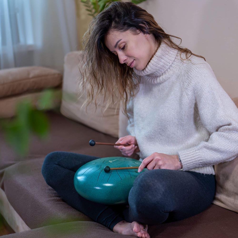 SonodrumSteelTongueDrumStandard-12Inches_11Tongues_CMajor-WomenPlaying