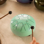 SonodrumSteelTongueDrumStandard-5.5Inches_8Tongues_CMajor-Play-LightBlue